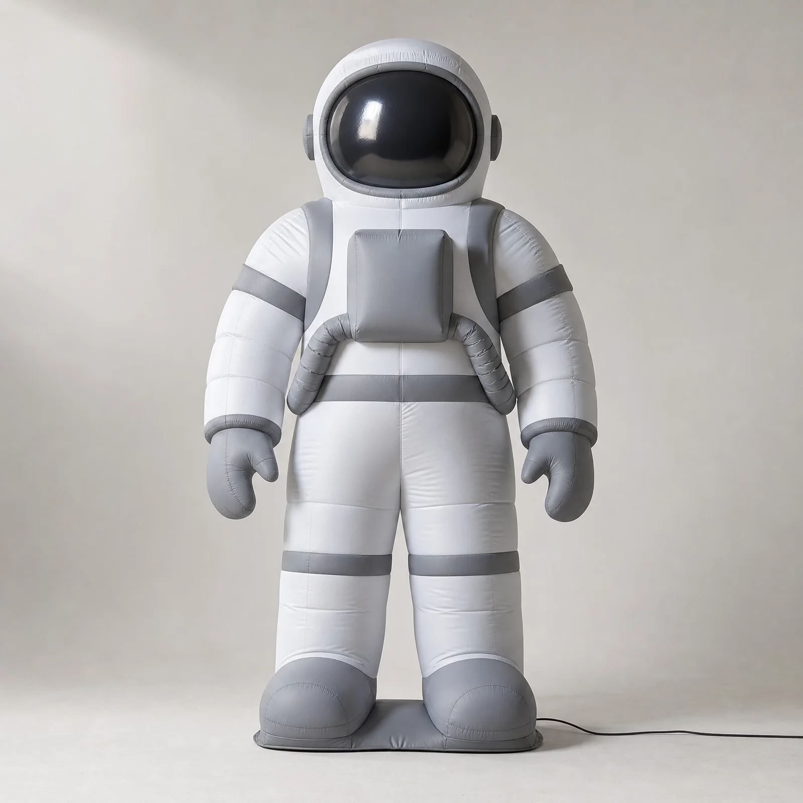 Original inflatable astronaut with helmet visor and gloved limbs