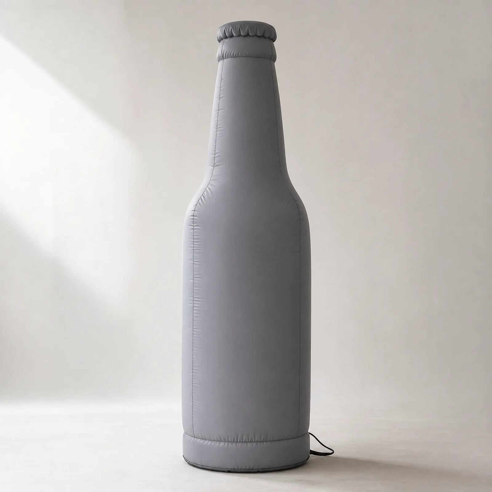 Long-neck inflatable bottle with a crown-cap profile