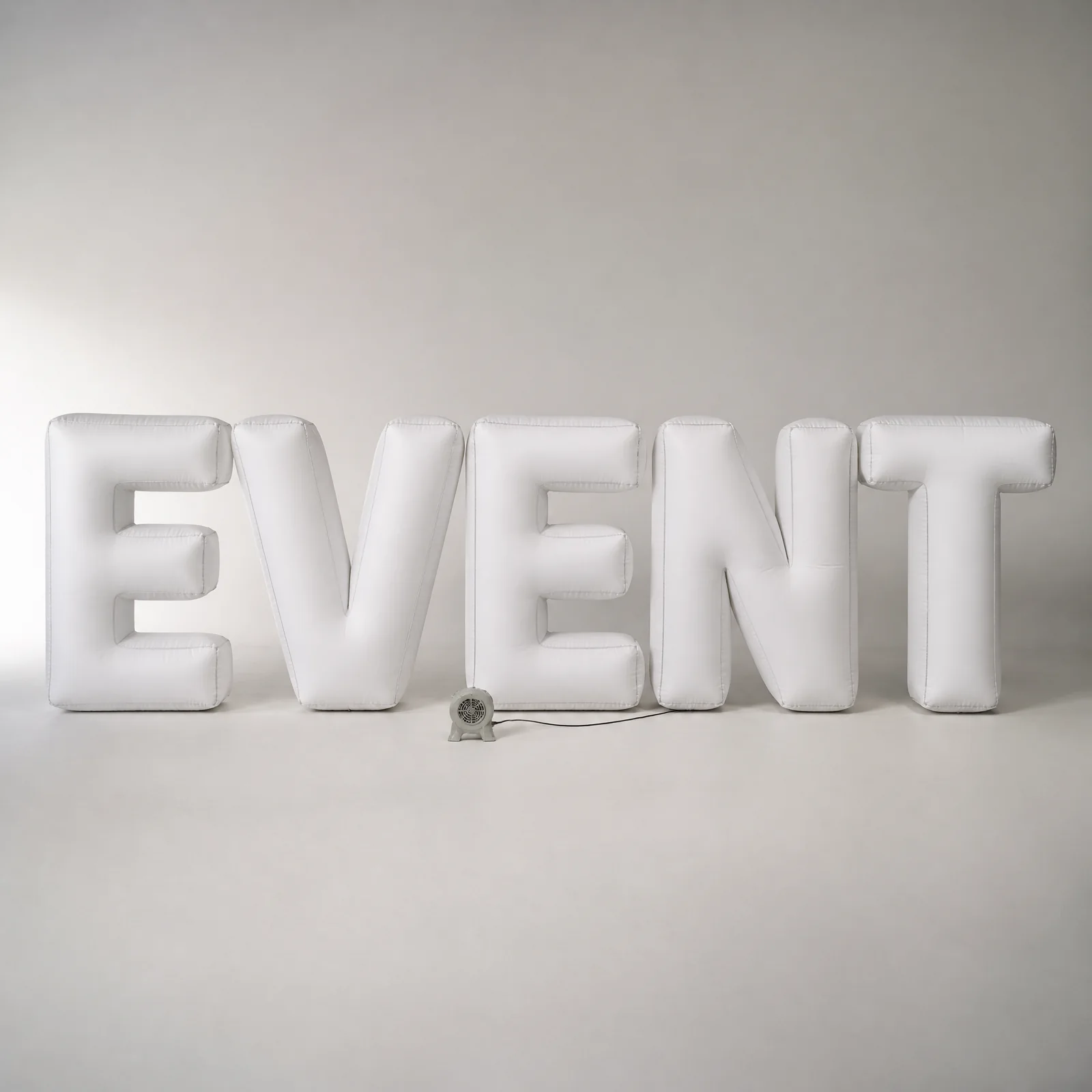 Separate inflatable event letters on a shared baseline