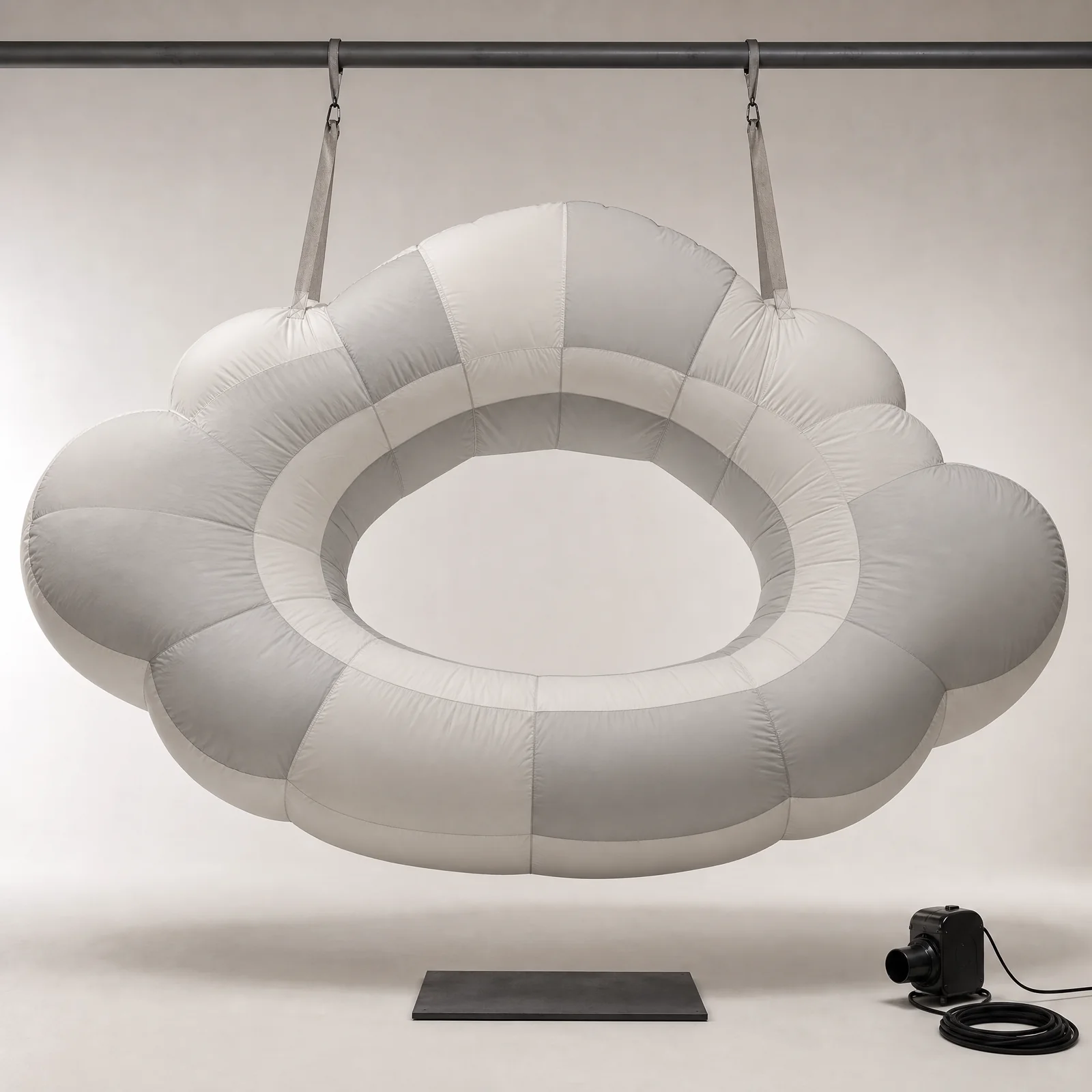 Suspended inflatable scenic forms above a stage