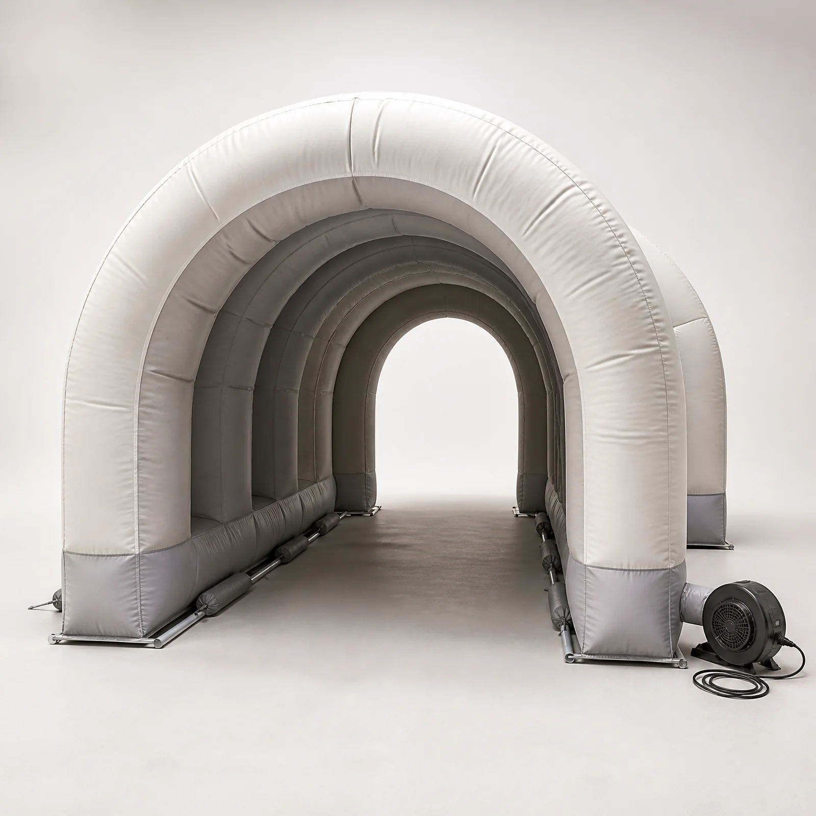 Repeating inflatable arches forming a clear visitor tunnel