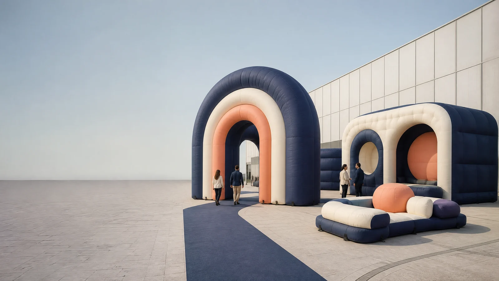 Professional commercial inflatable installations arranged across a large event environment.